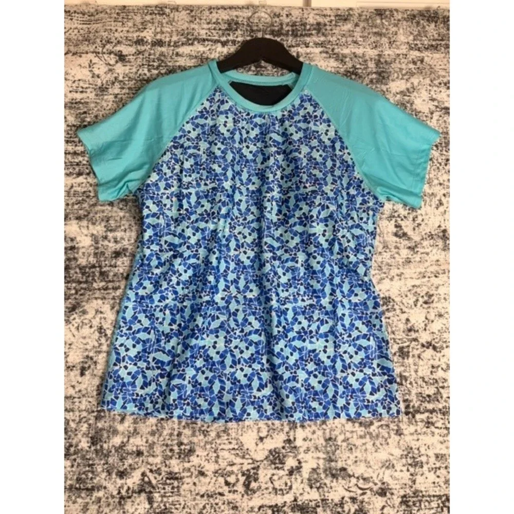 Women's blue swim shirt with built in shelf bra Size L